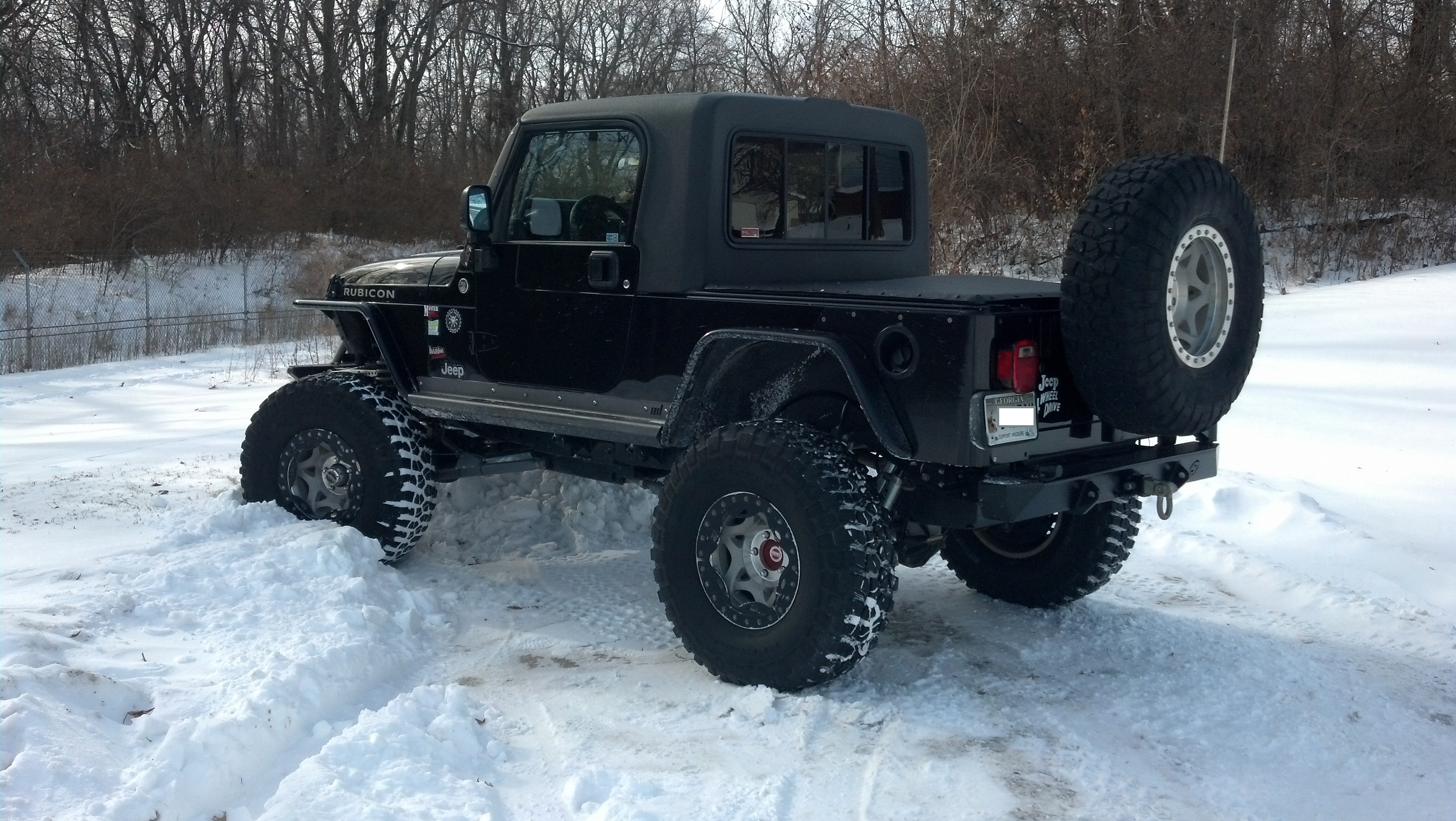 Hardtop to soft top jeep conversion